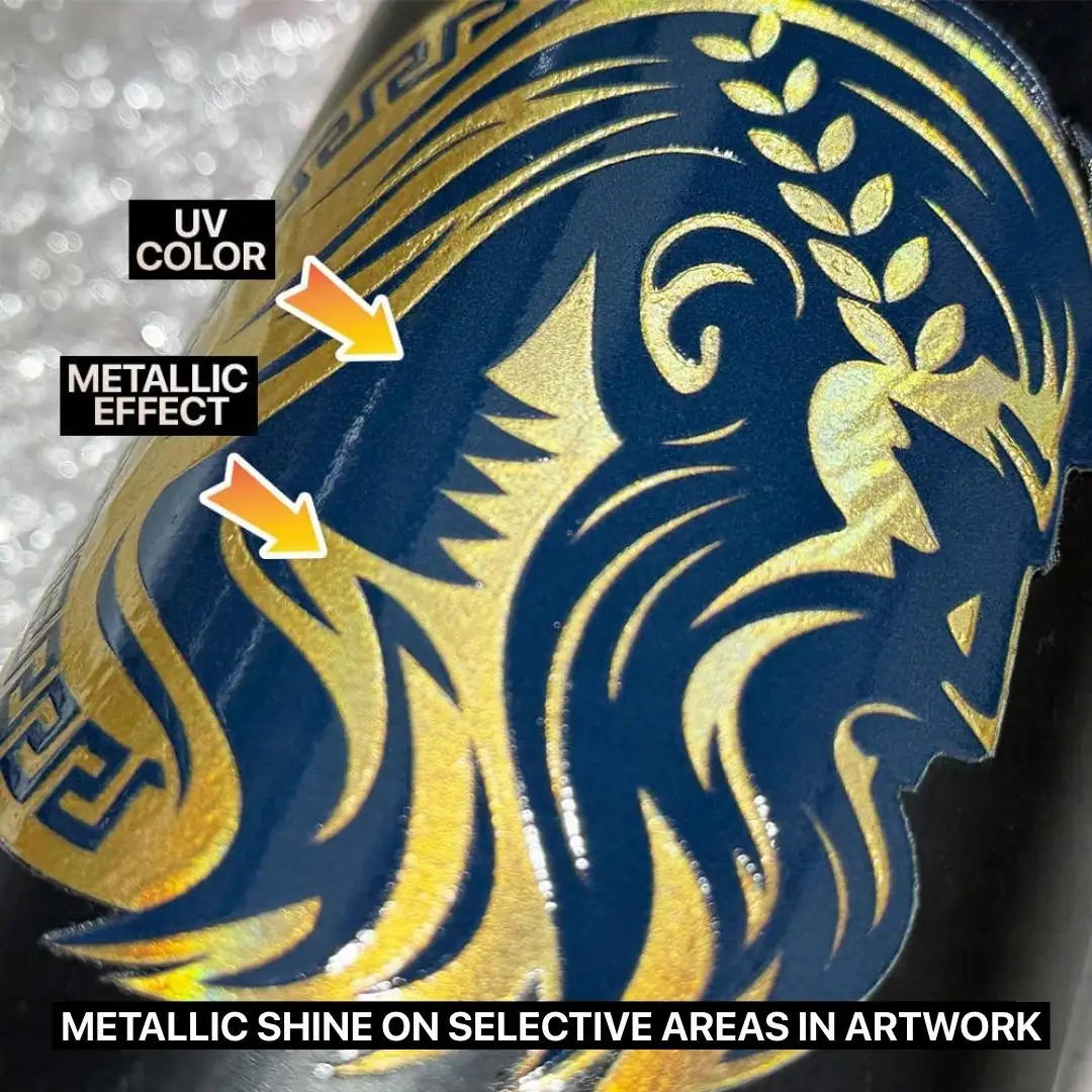 Close-up of a UV sticker design of Zeus in dark blue with hair in foiled golden colour on a black bottle.