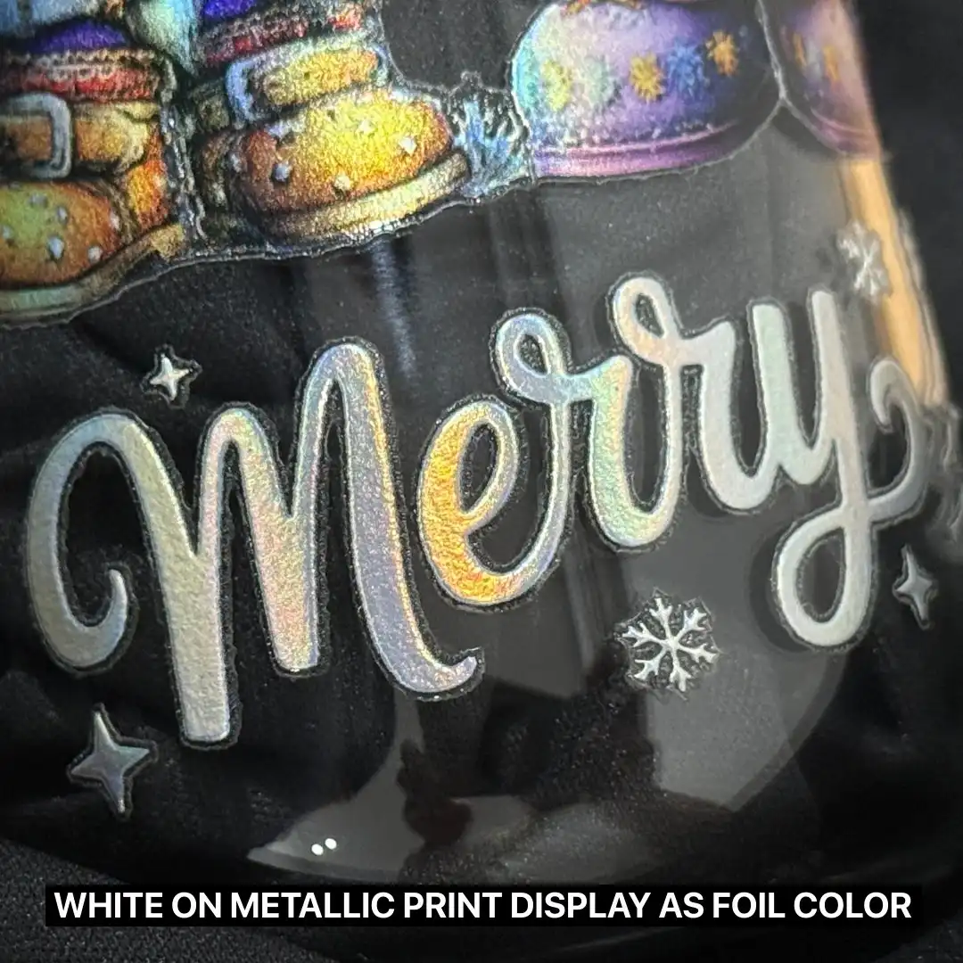 Close-up of a Merry Christmas wording in metallic white colour on transparent glass bottle.